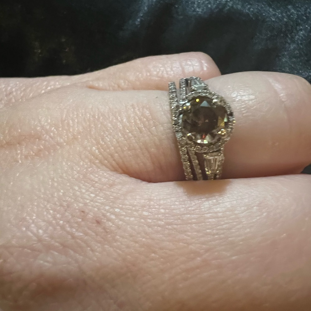 Absolutely beautiful 5/8 CT Chocolate Brown Center Diamond in a Halo setting